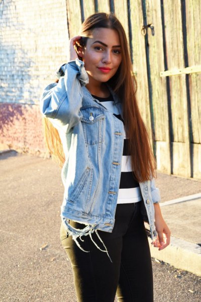 wide striped black and white sweater with denim jacket and jeans to wear