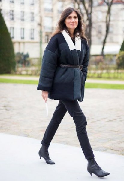 black coat with belt and short boots with kitten heel made of leather