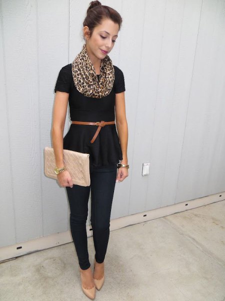 black short-sleeved peplum blouse with belt and pink clutch