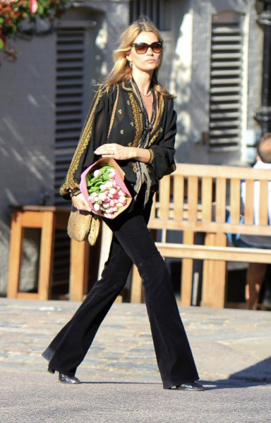 black blazer with scarf with leopard print and flared jeans