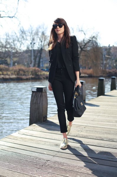 black blazer with matching blouse and cuffed jeans