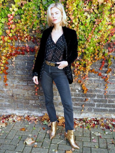 black blazer with a polka dot blouse and gold boots