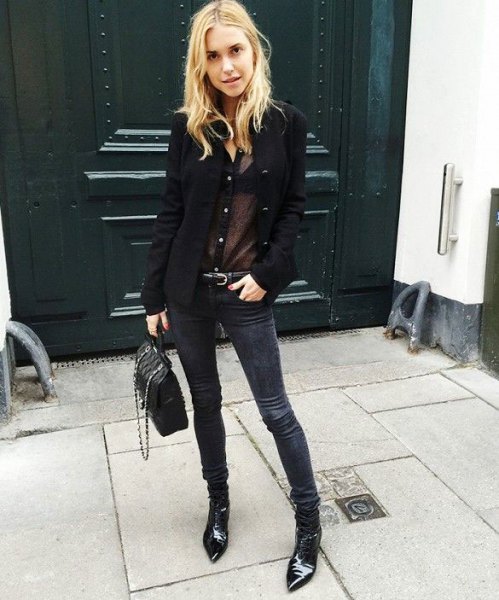 black blazer with a semi-transparent blouse and suede moto jeans