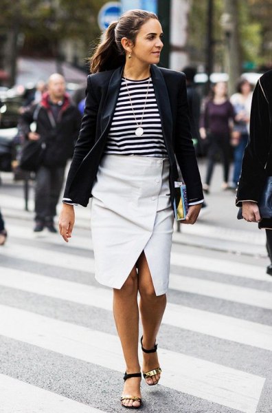 black blazer with striped T-shirt and white midi envelope skirt