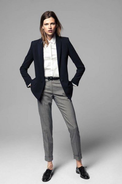 black blazer with white shirt with buttons and gray suit trousers with cuffs