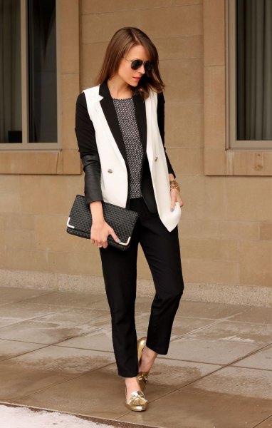 black blazer with white long vest and gold metallic slippers