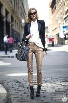 black blazer with white shirt and narrow golden trousers