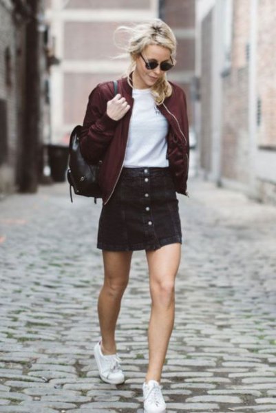black bomber jacket with matching button front skirt