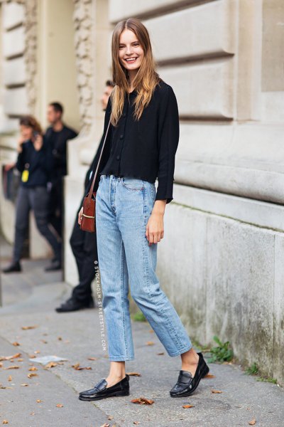 black shirt with buttons with light blue mom jeans and casual slippers