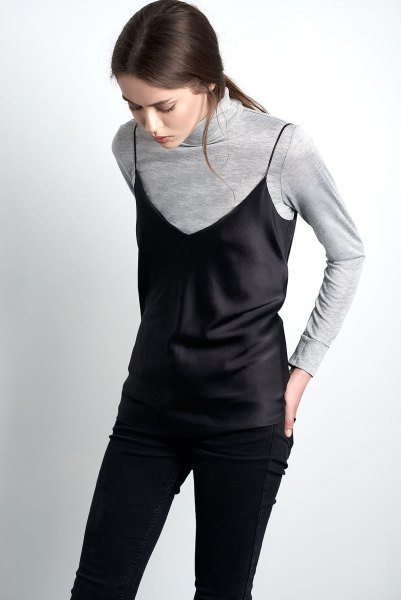 black camisole over gray turtleneck sweater