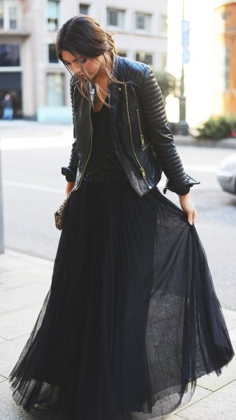 black maxi dress made of pleated chiffon with leather jacket