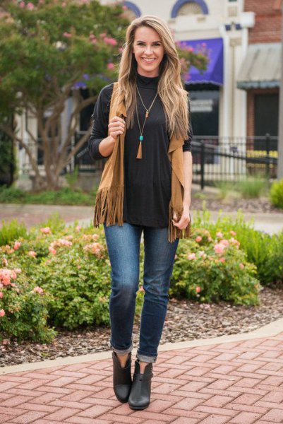 black long-sleeved t-shirt camel vest with round neck