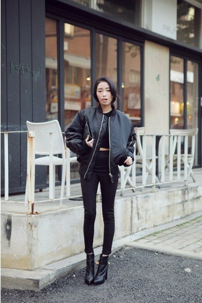 black crop top with skinny jeans and leather flight jacket