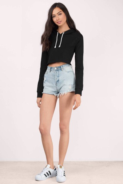 black, cropped hoodie jeans shorts, white sneakers