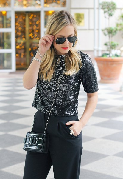 black, cropped sequin top with slim fit jeans