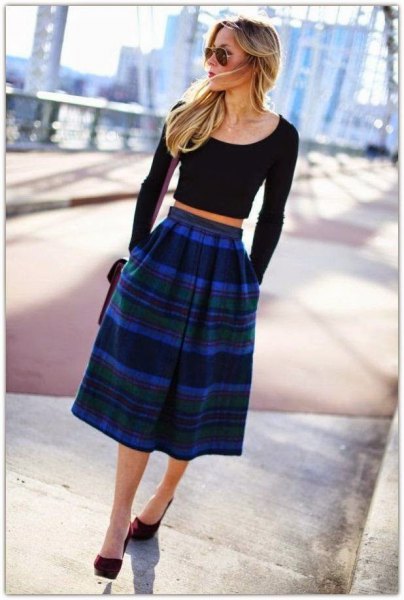 black shortened sweater with blue checked midi skirt