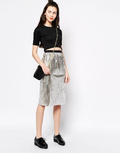 black short t-shirt high waisted silver metallic skirt
