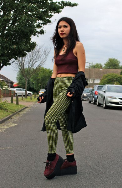 black short tank top with shocking green checked drainpipe pants
