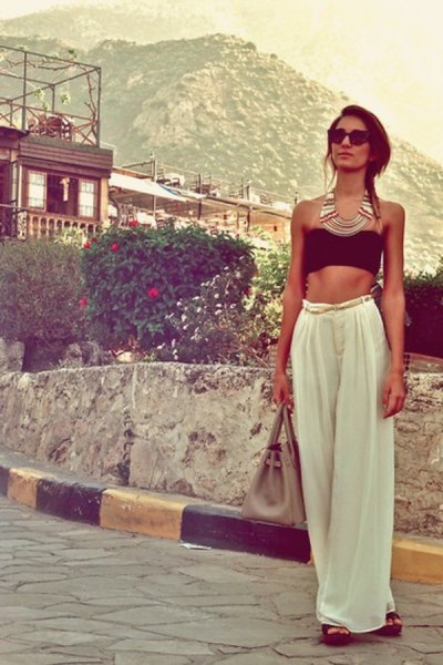 black short tube top with white trousers with wide legs