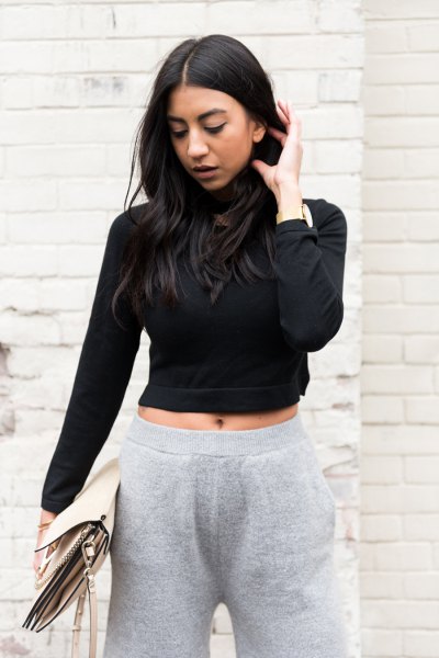 black, short cut turtleneck with gray knitted pants with wide legs