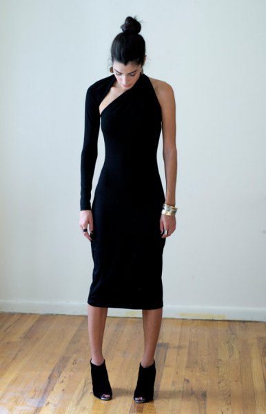 black neckline of a strapless midi dress with boots