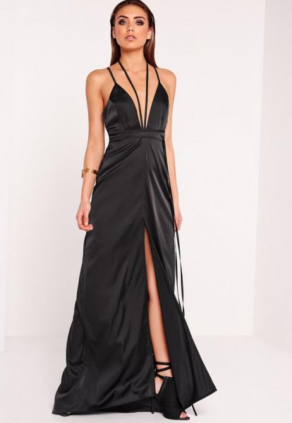 black, deep maxi dress with deep V-neck and flared high split