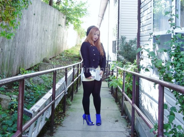 black denim jacket with white mini-shorts and royal blue boots with heels