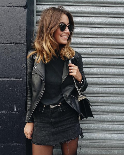 black denim skirt with sweater and leather jacket