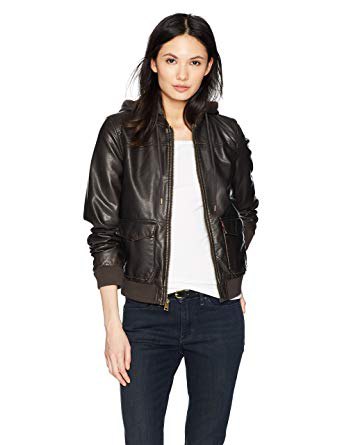 black bomber jacket with hood made of faux leather and dark blue jeans with low waist