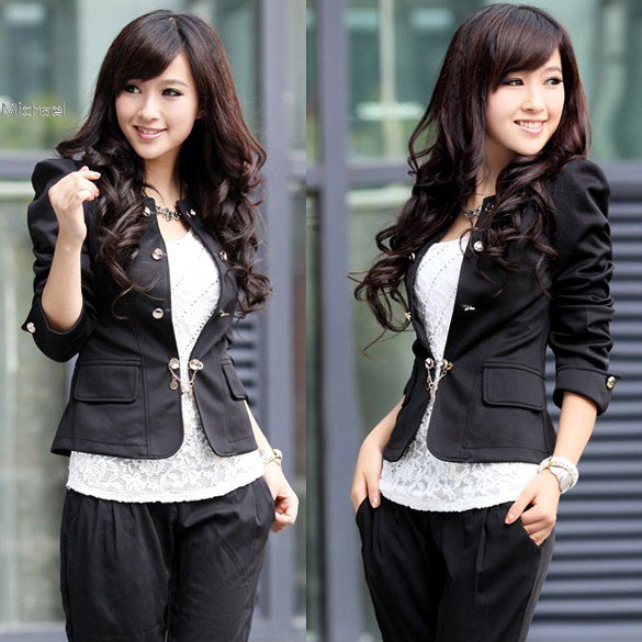 black waisted cotton blazer with lace top and loosely cut trousers