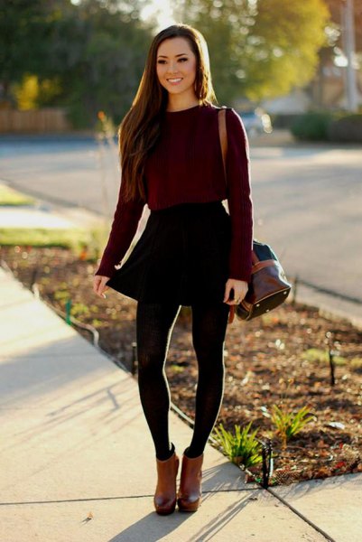 black fitted sweater with skater mini skirt and brown leather ankle boots