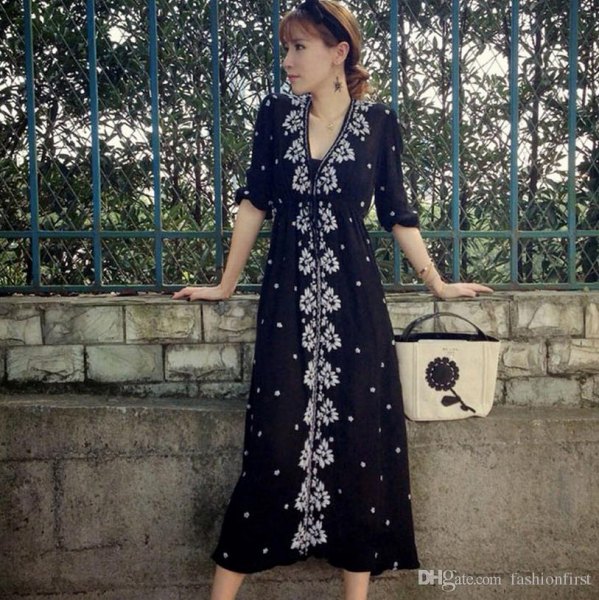 black midi dress with flower button in front