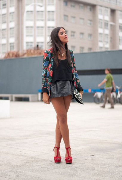 black blazer with floral pattern and mini leather skirt