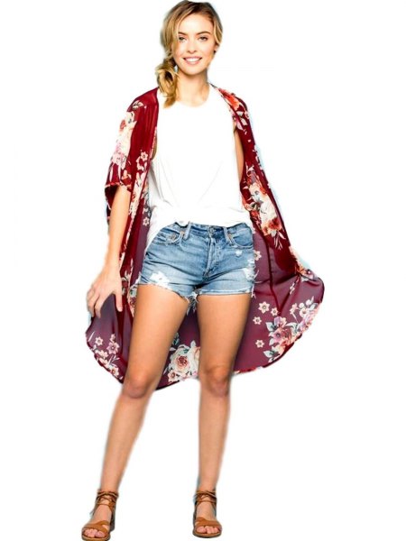 black, see-through longline cardigan with floral pattern, white sleeveless top and denim shorts