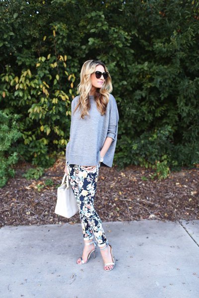 black, floral printed trouser sweater with batwing sleeves