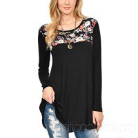 black tunic top with floral pattern and ribbed skinny jeans