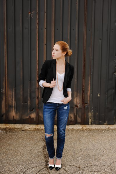 black half-sleeved jacket with white tank top with scoop neck and blue jeans