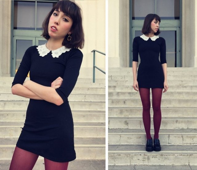 black dress with scalloped collar and stockings and oxford shoes