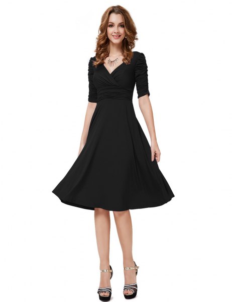Black, half-sleeved V-neck fit and knee-length cocktail dress with flare