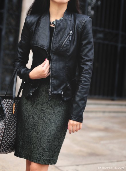 black jacket with knee-length dark green embroidered dress