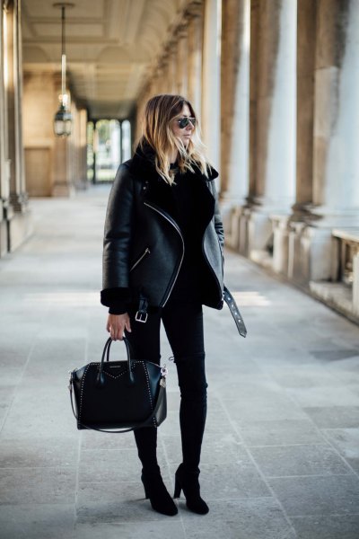 black jacket with skinny jeans and boots with ankle heel