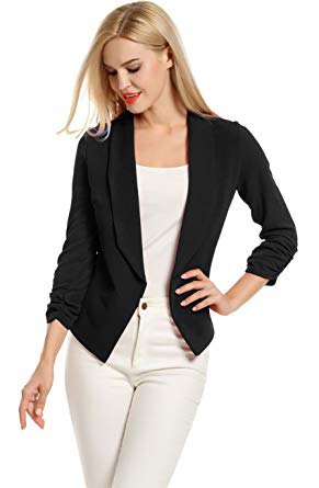 black knitted blazer with white top with a scoop neckline and matching skinny jeans