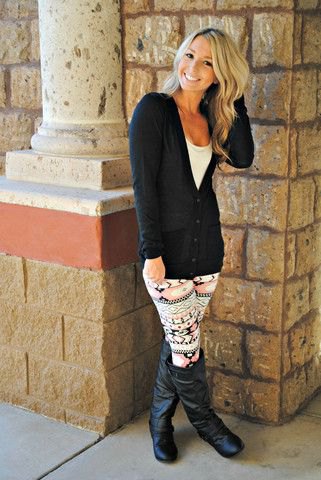 black cardigan with leggings and knee-high leather boots