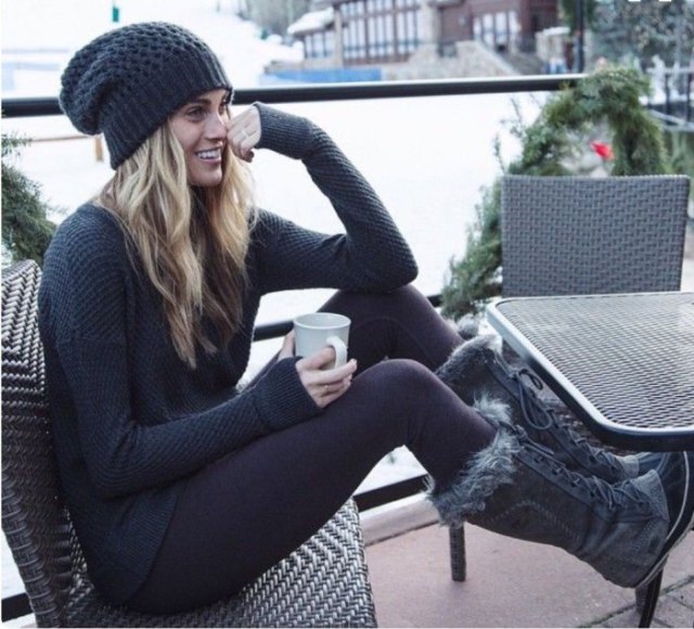 black knitted hat with matching sweater and knee-high snowshoes