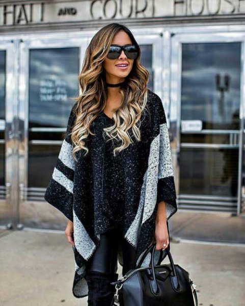 black knitted poncho with wide, wide stripes