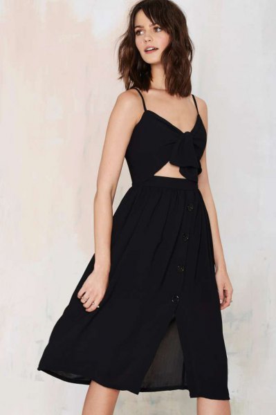 black, knotted, flared dress neckline at the waist
