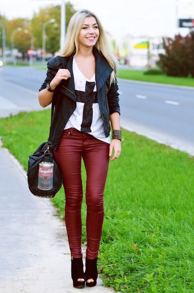 black leather blazer with matching red drainpipe trousers