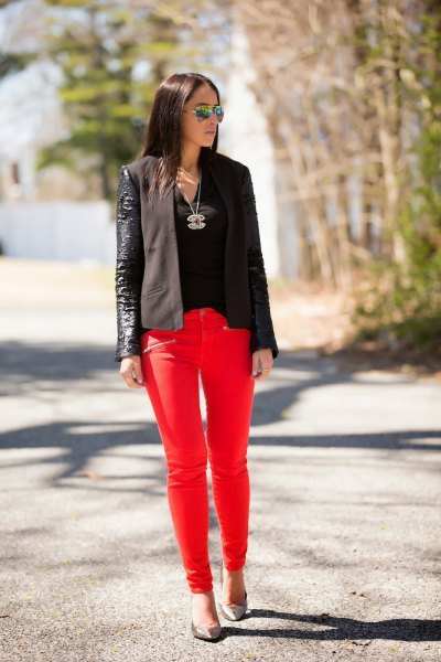 black leather blazer with red skinny jeans
