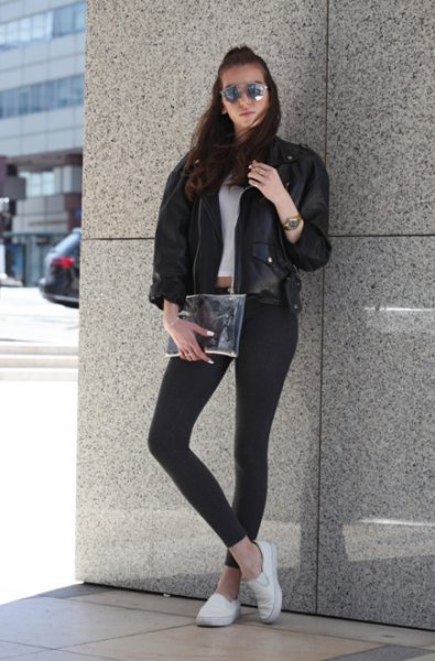 black leather bomber jacket with cropped T-shirt and white canvas sneakers