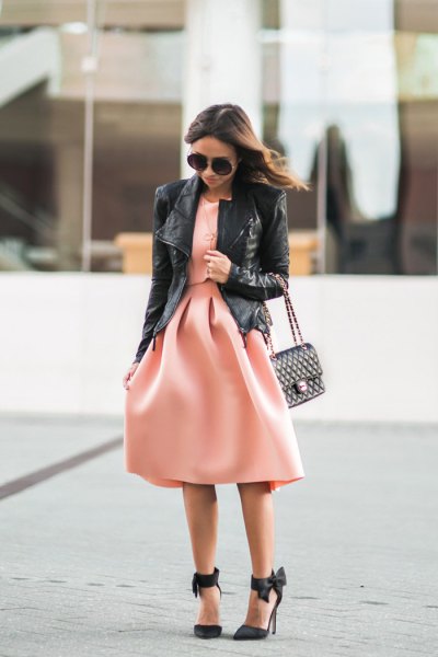 black leather jacket with blushing pink fit and flared midi dress